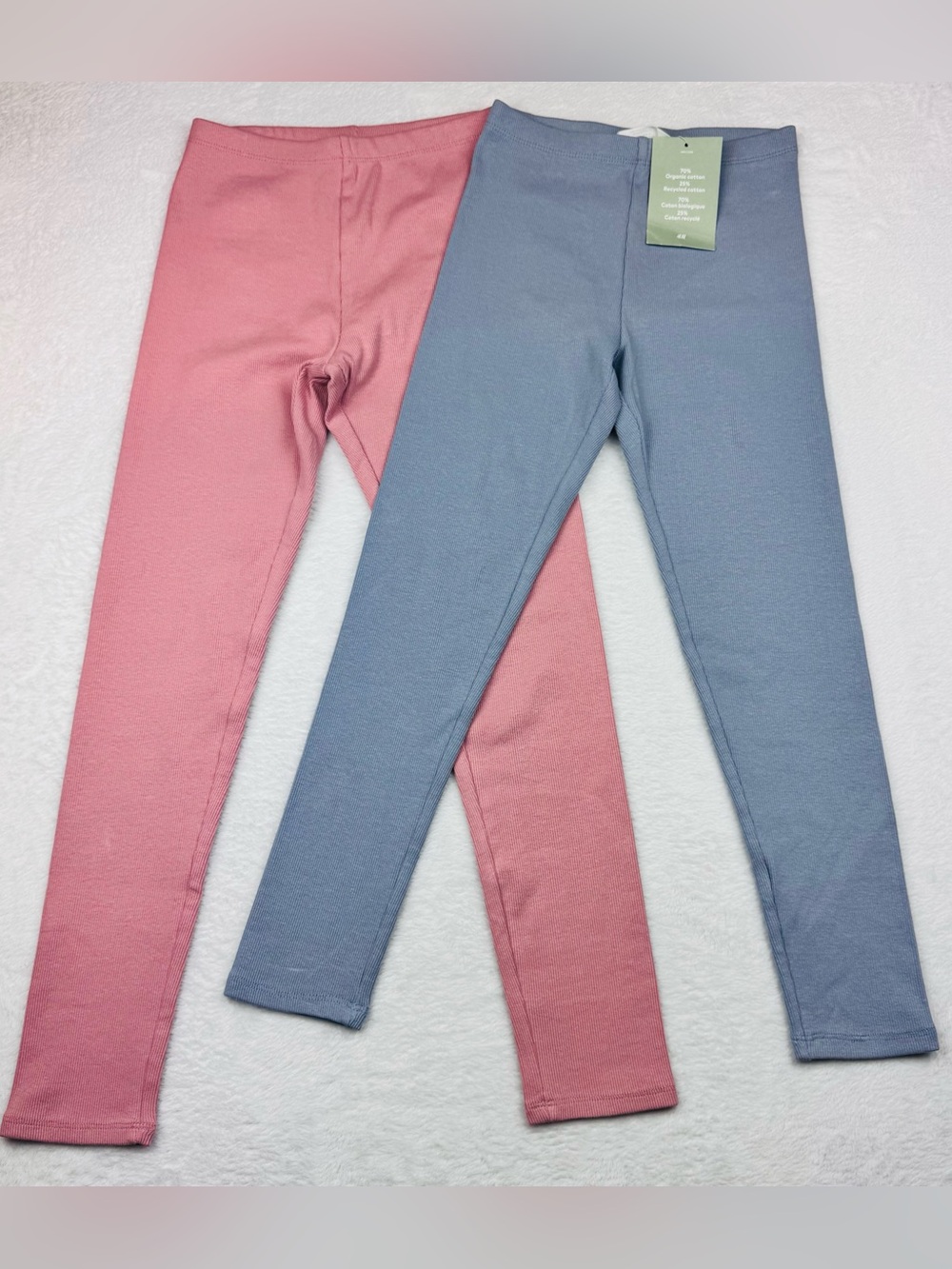 H&M leggings. Blue are a size 8. The pink are a size 10. Brand new condition.